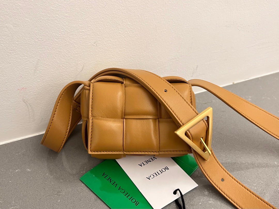 bo*te*ga Ve*ne*ta candy padded cassette bag in camel lambskin