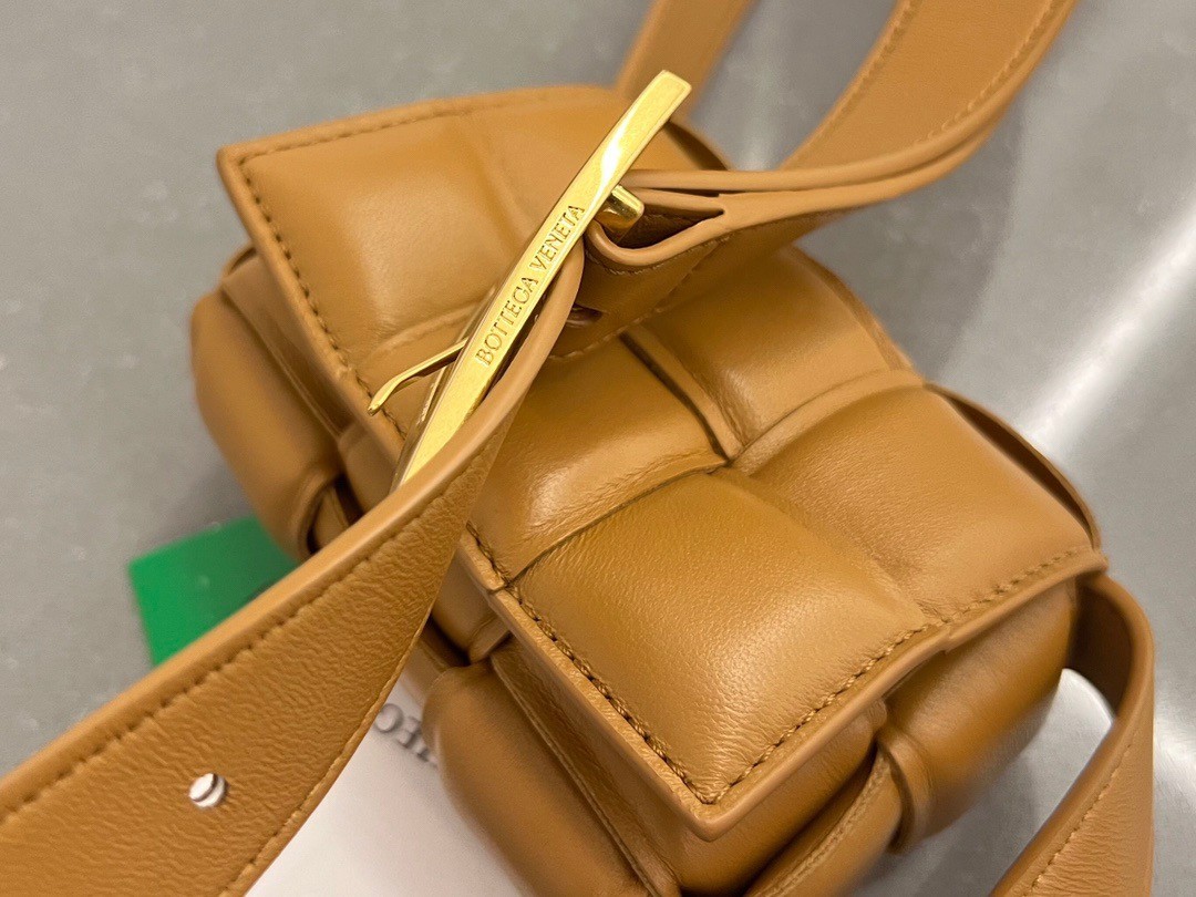 bo*te*ga Ve*ne*ta candy padded cassette bag in camel lambskin