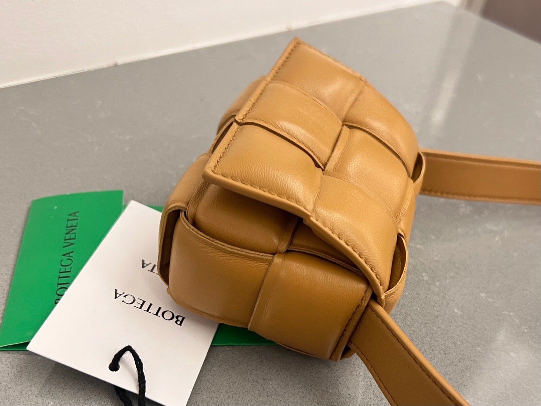 bo*te*ga Ve*ne*ta candy padded cassette bag in camel lambskin