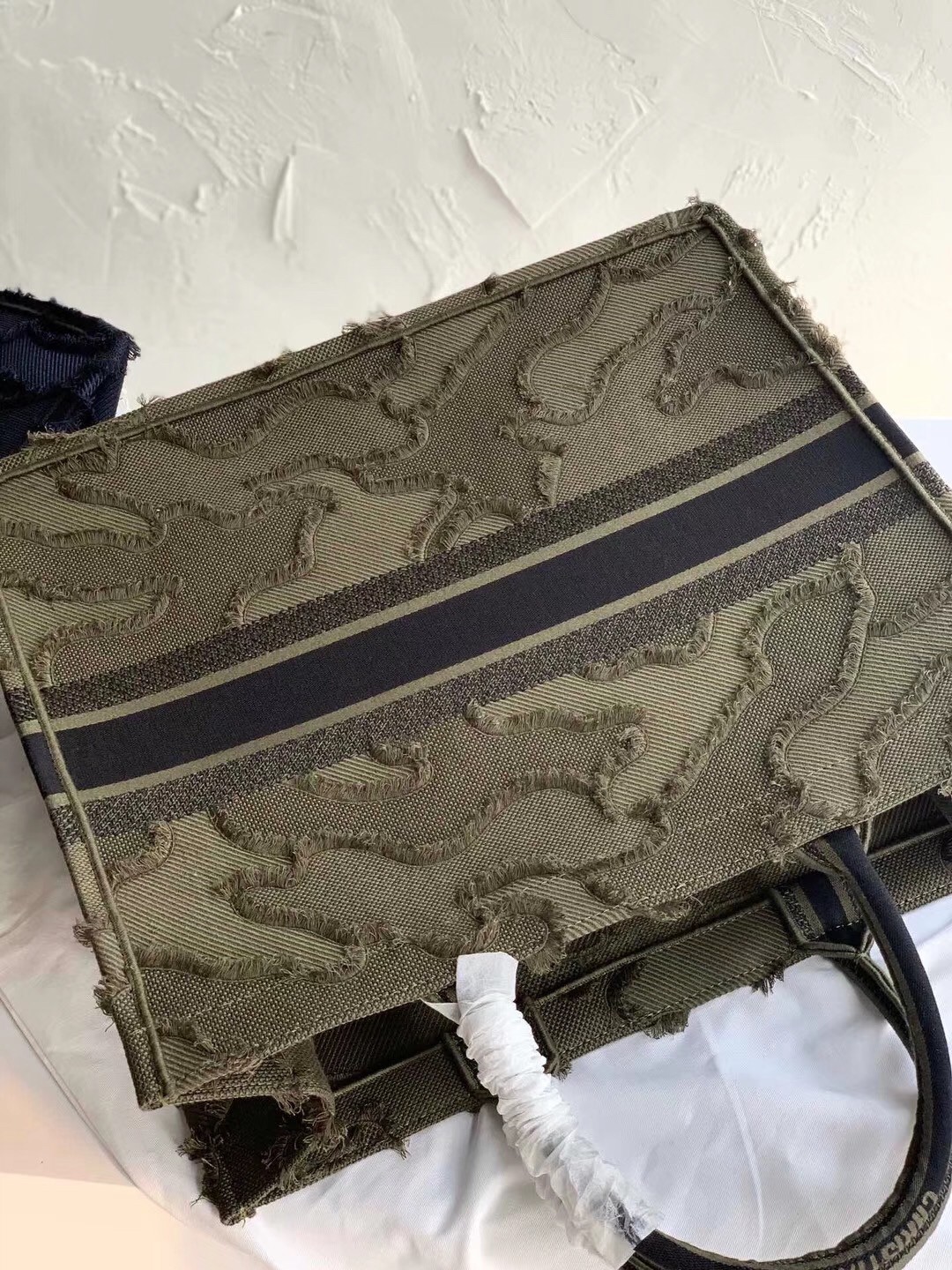 D*or book tote bag in green camouflage embroidered canvas