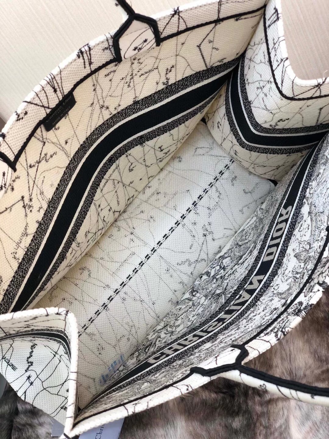 D*or book tote bag in latte zodiac embroidery