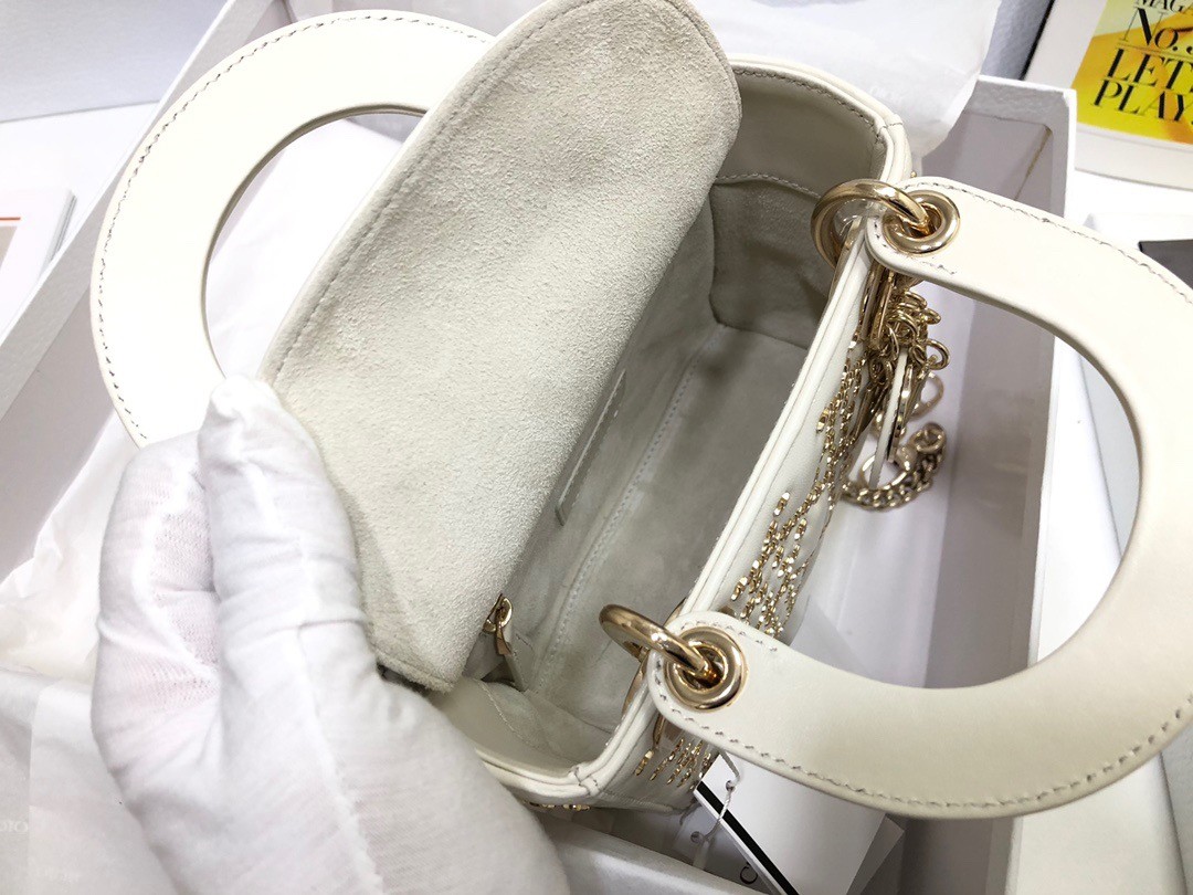 D*or mini lady D*or bag in white lambskin with star embroidery