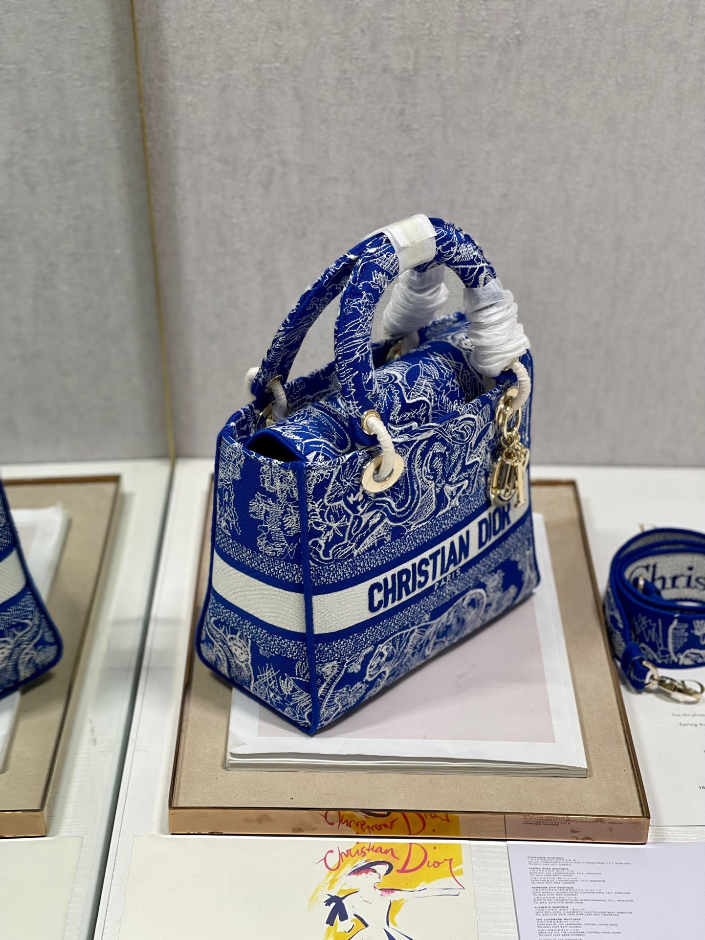 D*or medium lady d-lite bag in fluorescent blue toile de jouy reverse embroidery