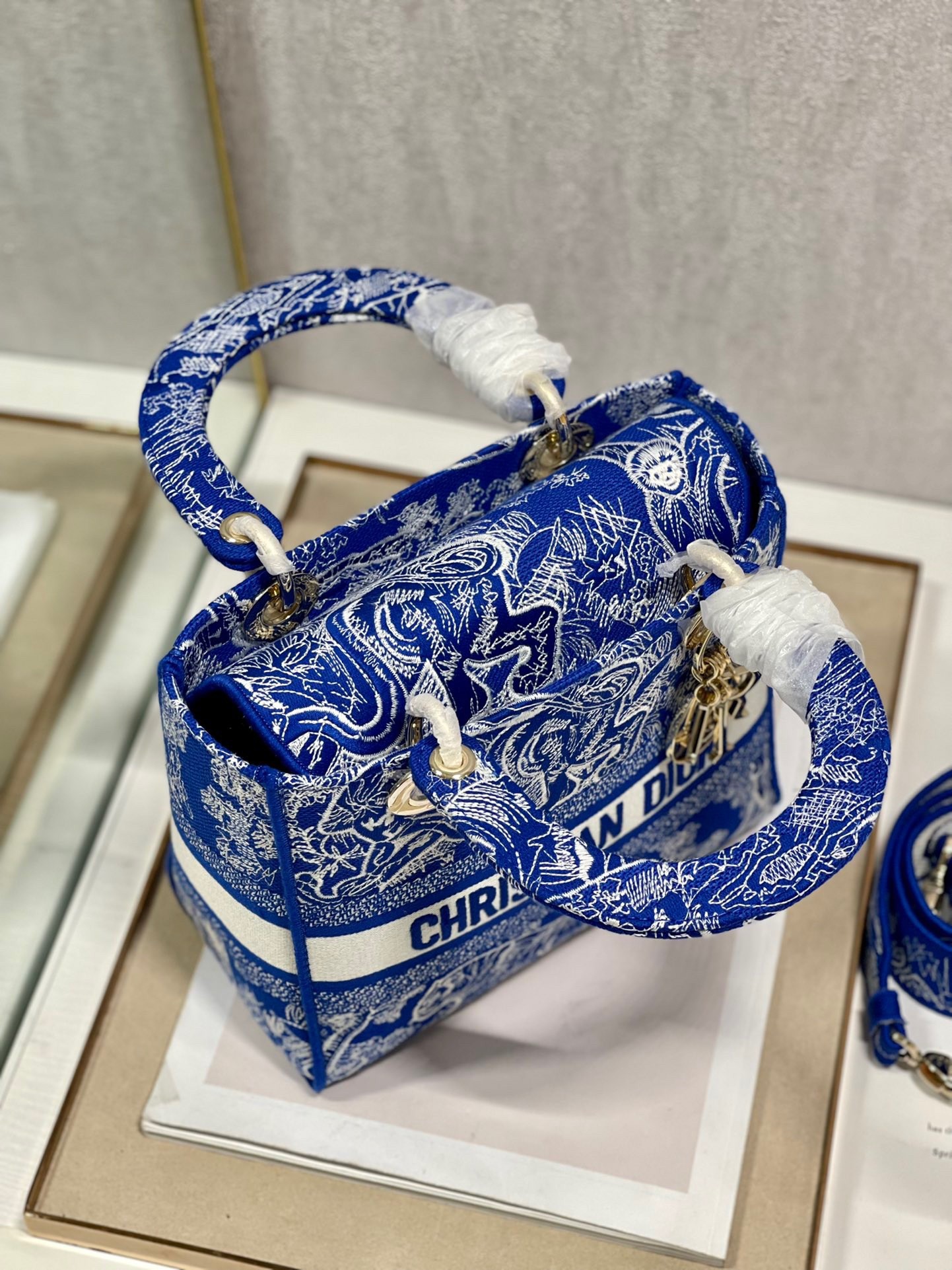 D*or medium lady d-lite bag in fluorescent blue toile de jouy reverse embroidery