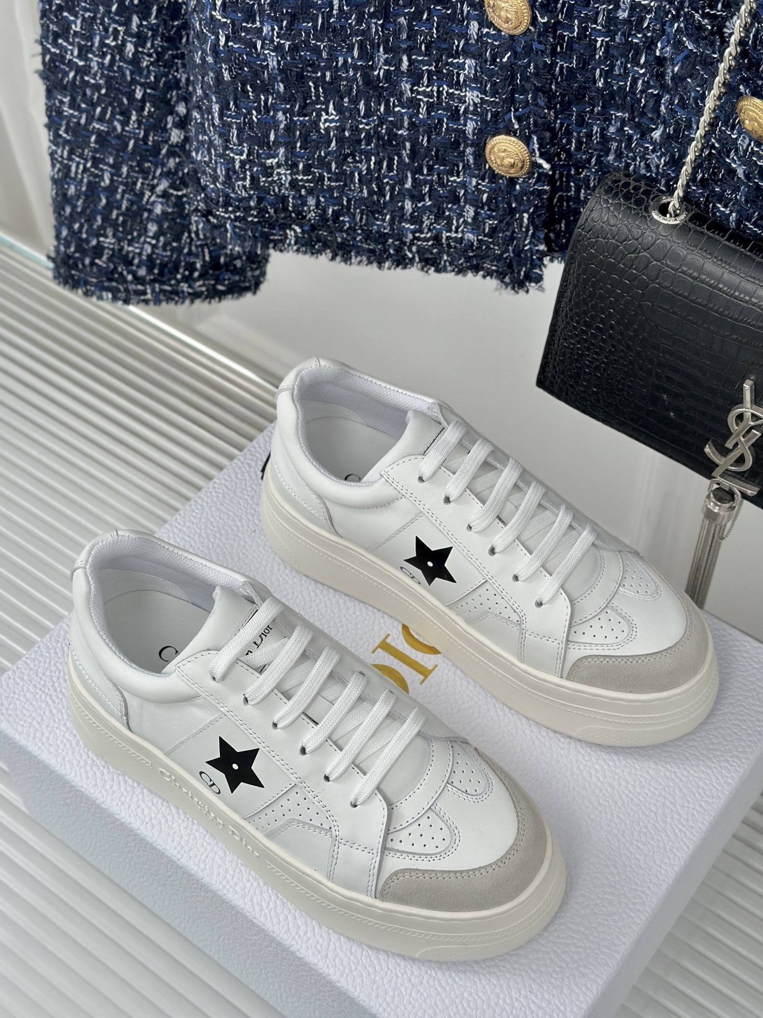 D*or star platform sneakers in white calfskin with black star