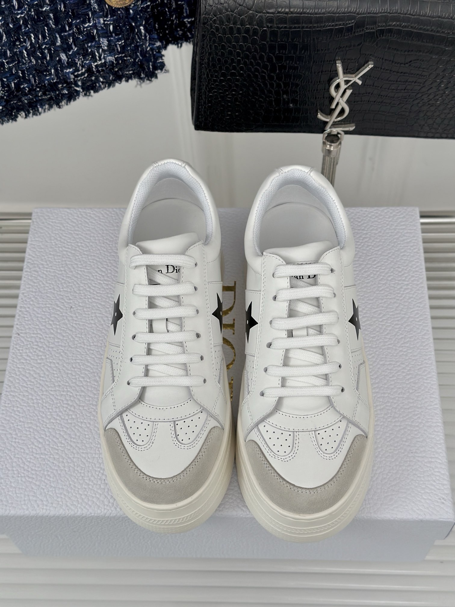 D*or star platform sneakers in white calfskin with black star