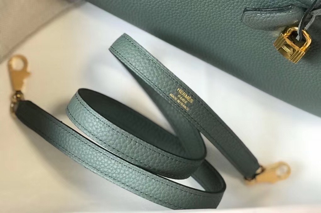 H**mes kelly 25cm retourne bag in vert amande clemence leather