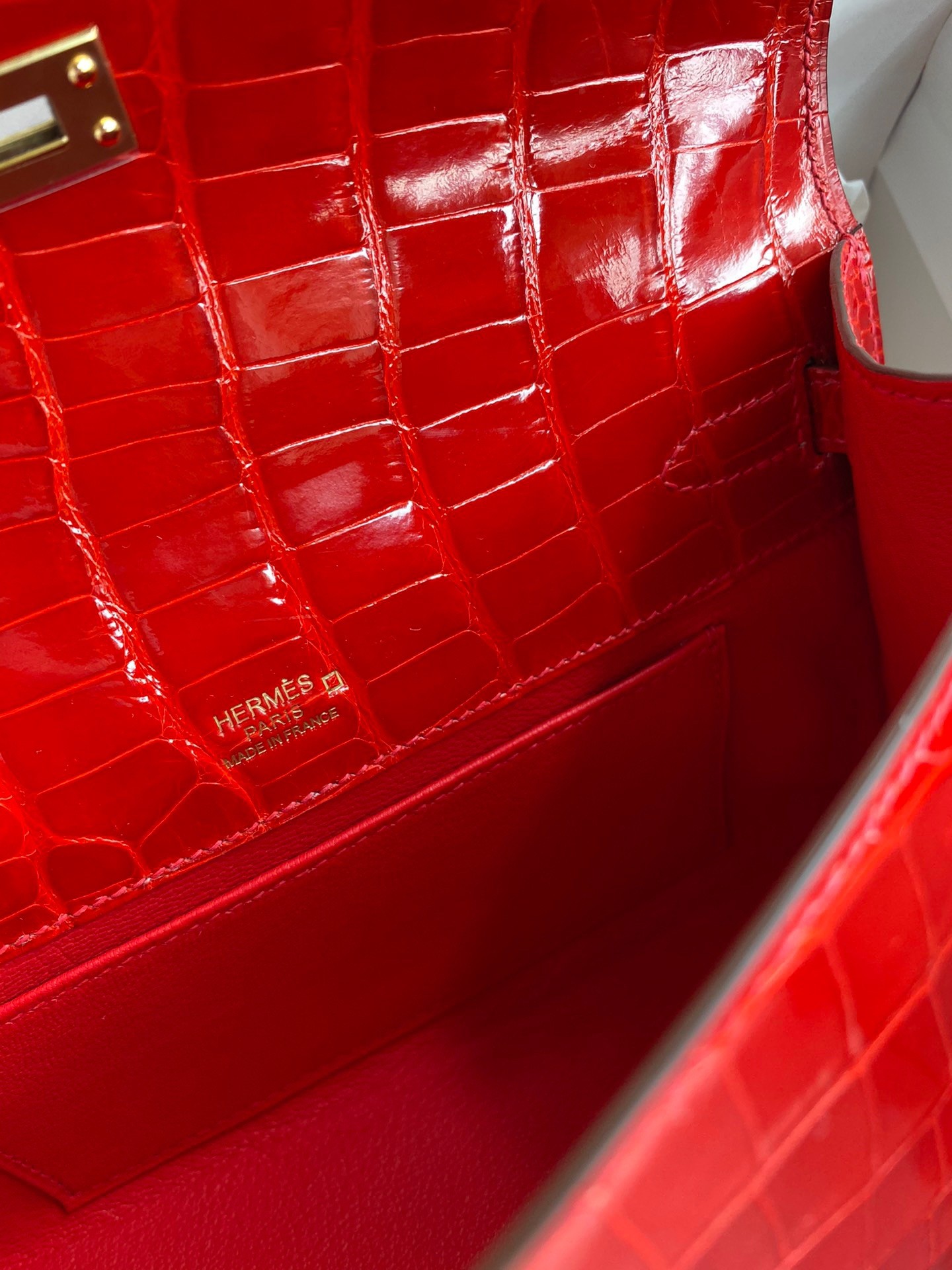 H**mes kelly pochette handmade bag in red shiny alligator leather
