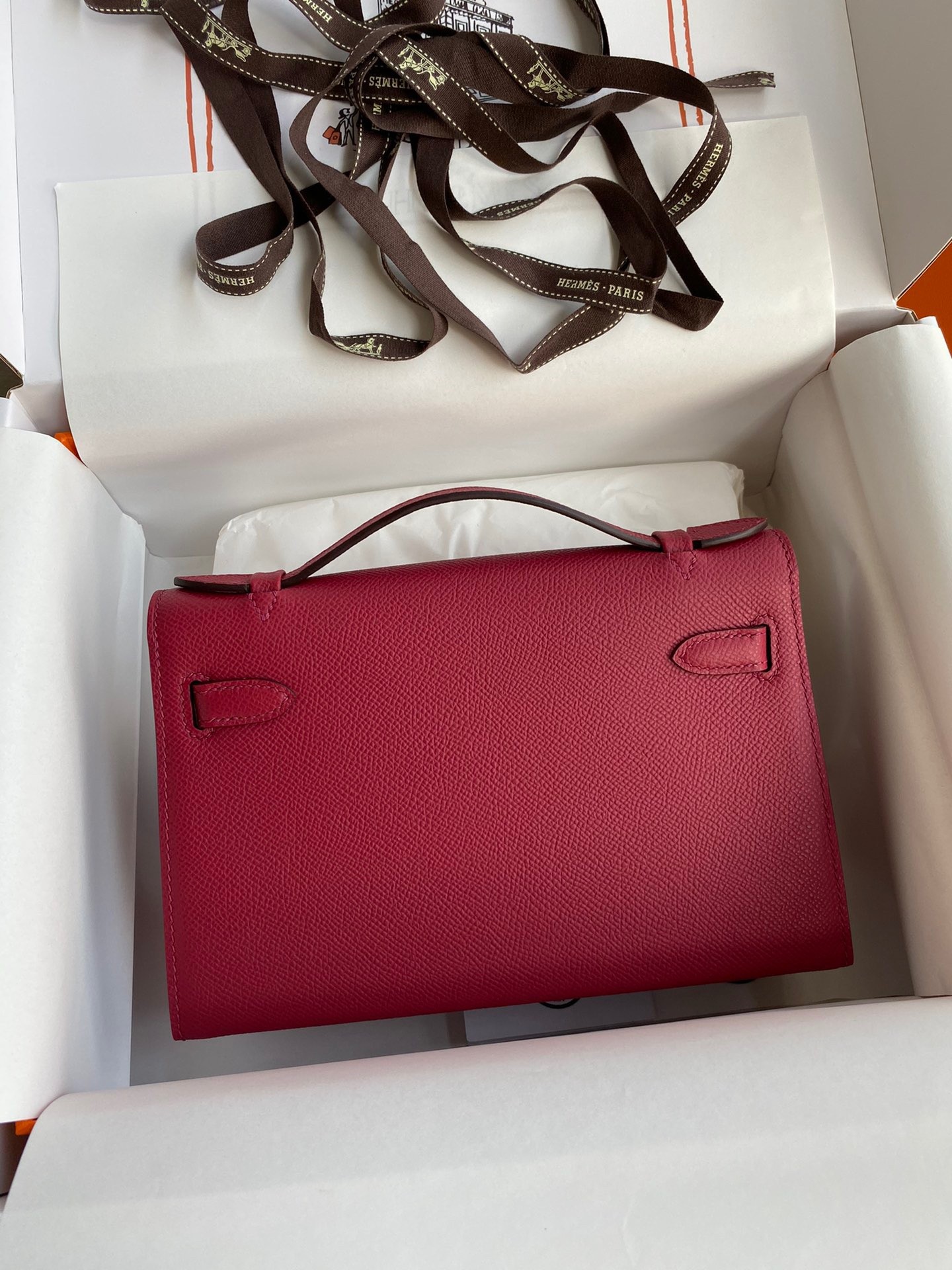 H**mes kelly pochette handmade bag in ruby epsom calfskin