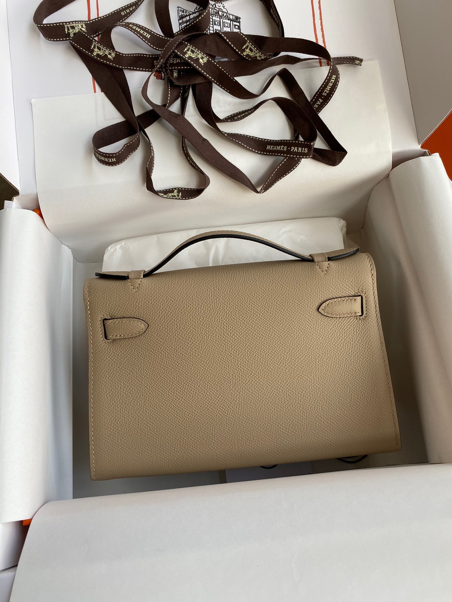 H**mes kelly pochette handmade bag in trench epsom calfskin