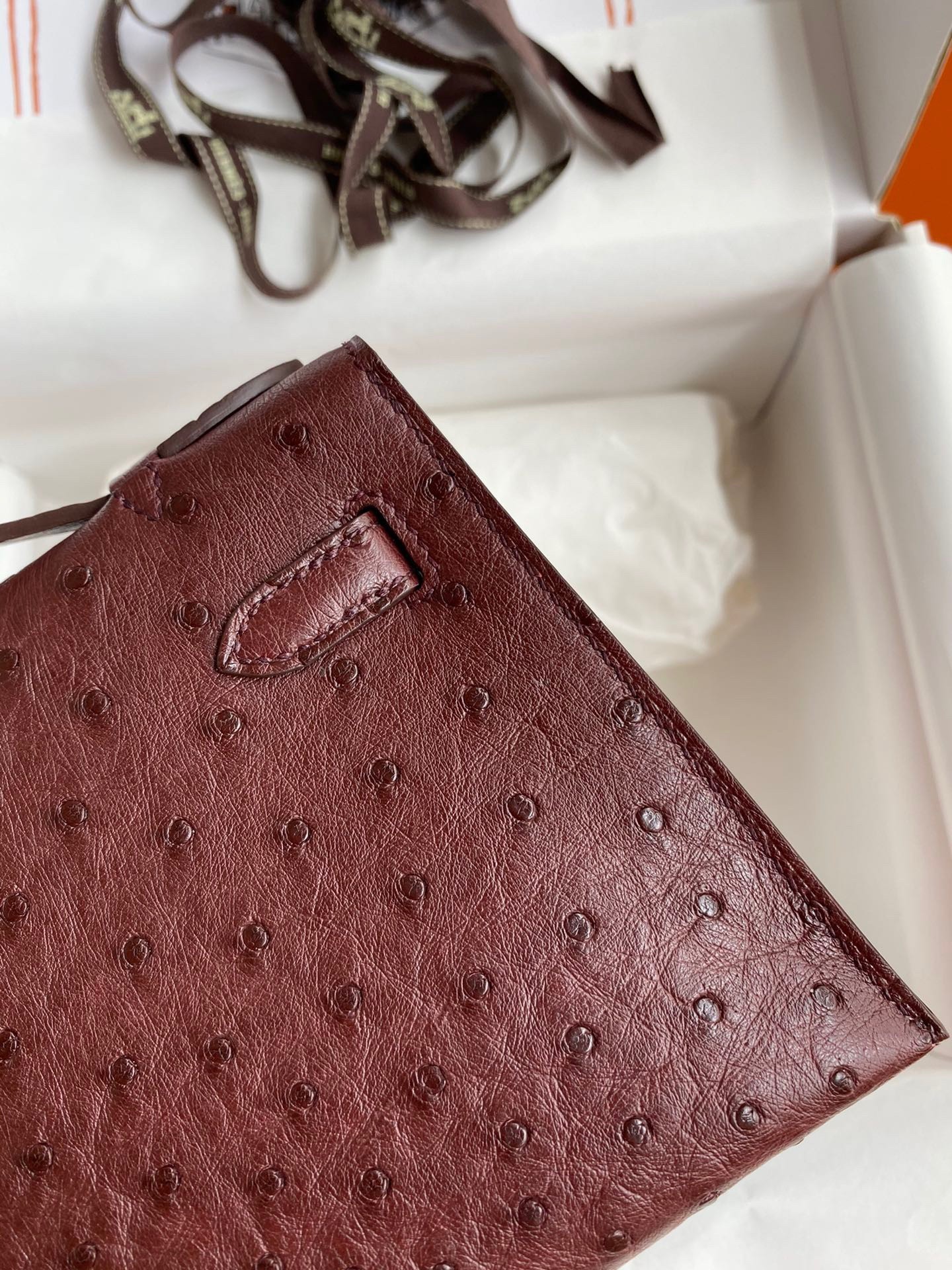 H**mes kelly pochette handmade bag in bordeaux ostrich leather
