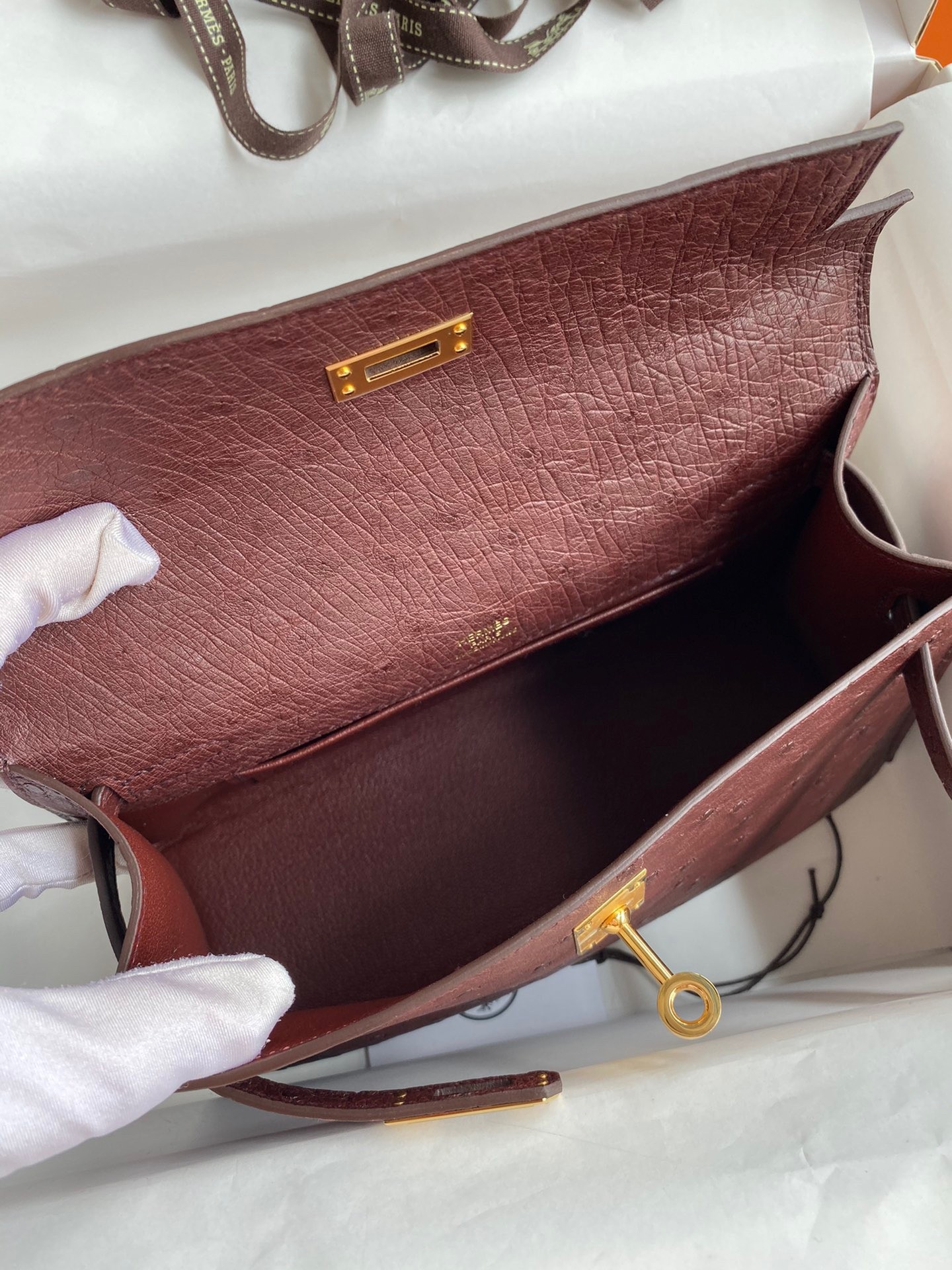 H**mes kelly pochette handmade bag in bordeaux ostrich leather