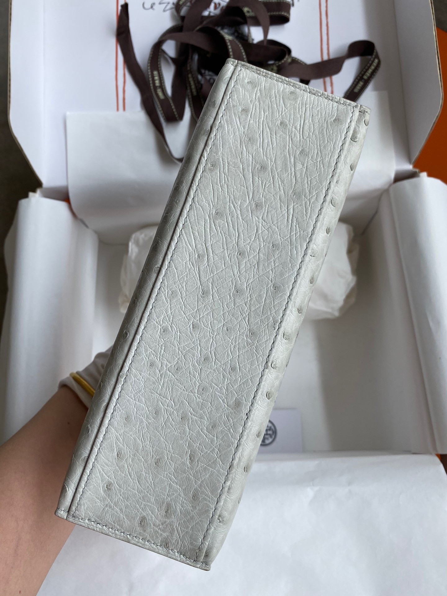 H**mes kelly pochette handmade bag in pearl grey ostrich leather