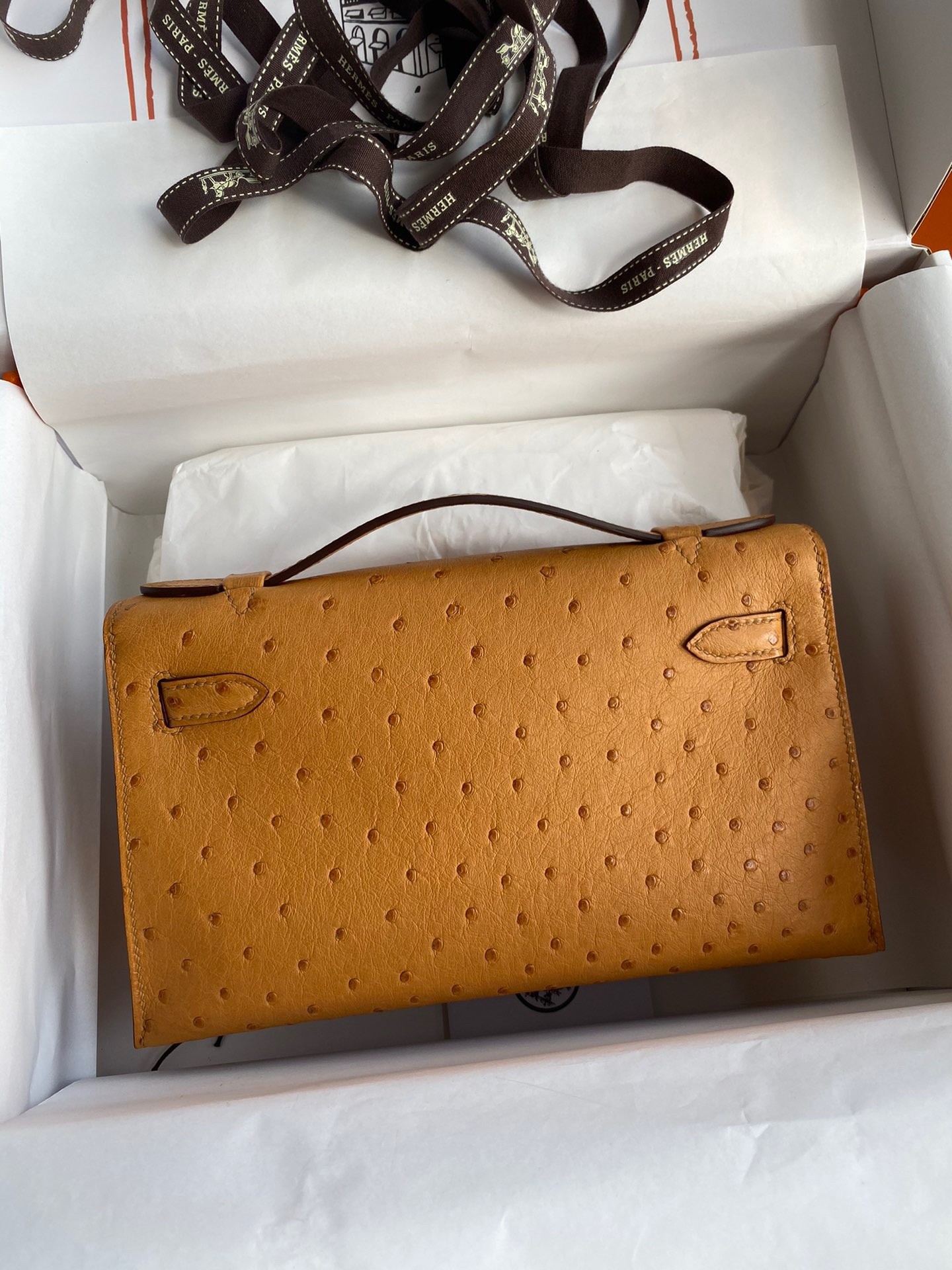 H**mes kelly pochette handmade bag in sesame ostrich leather