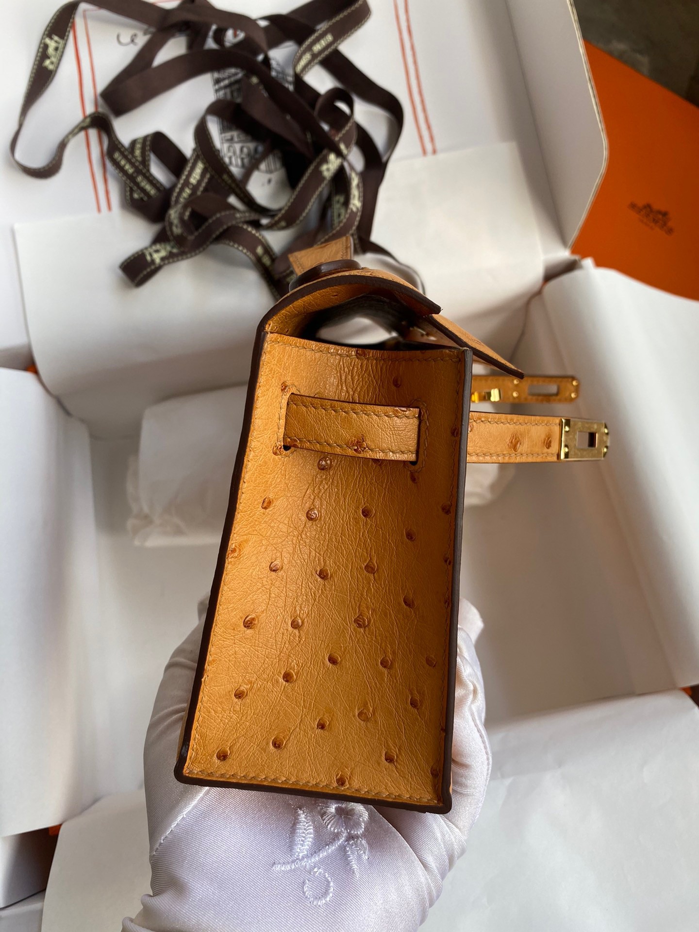 H**mes kelly pochette handmade bag in sesame ostrich leather