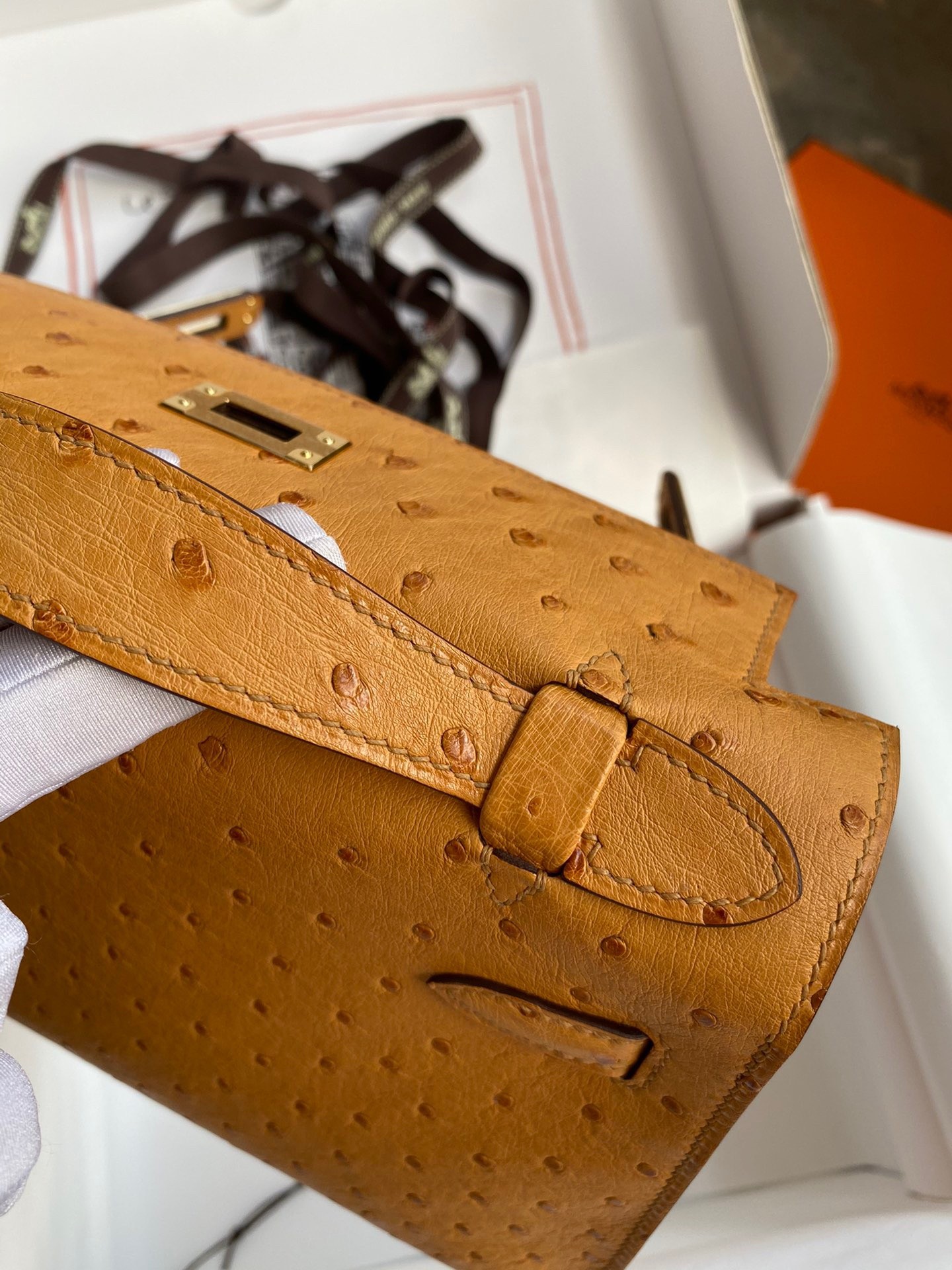 H**mes kelly pochette handmade bag in sesame ostrich leather