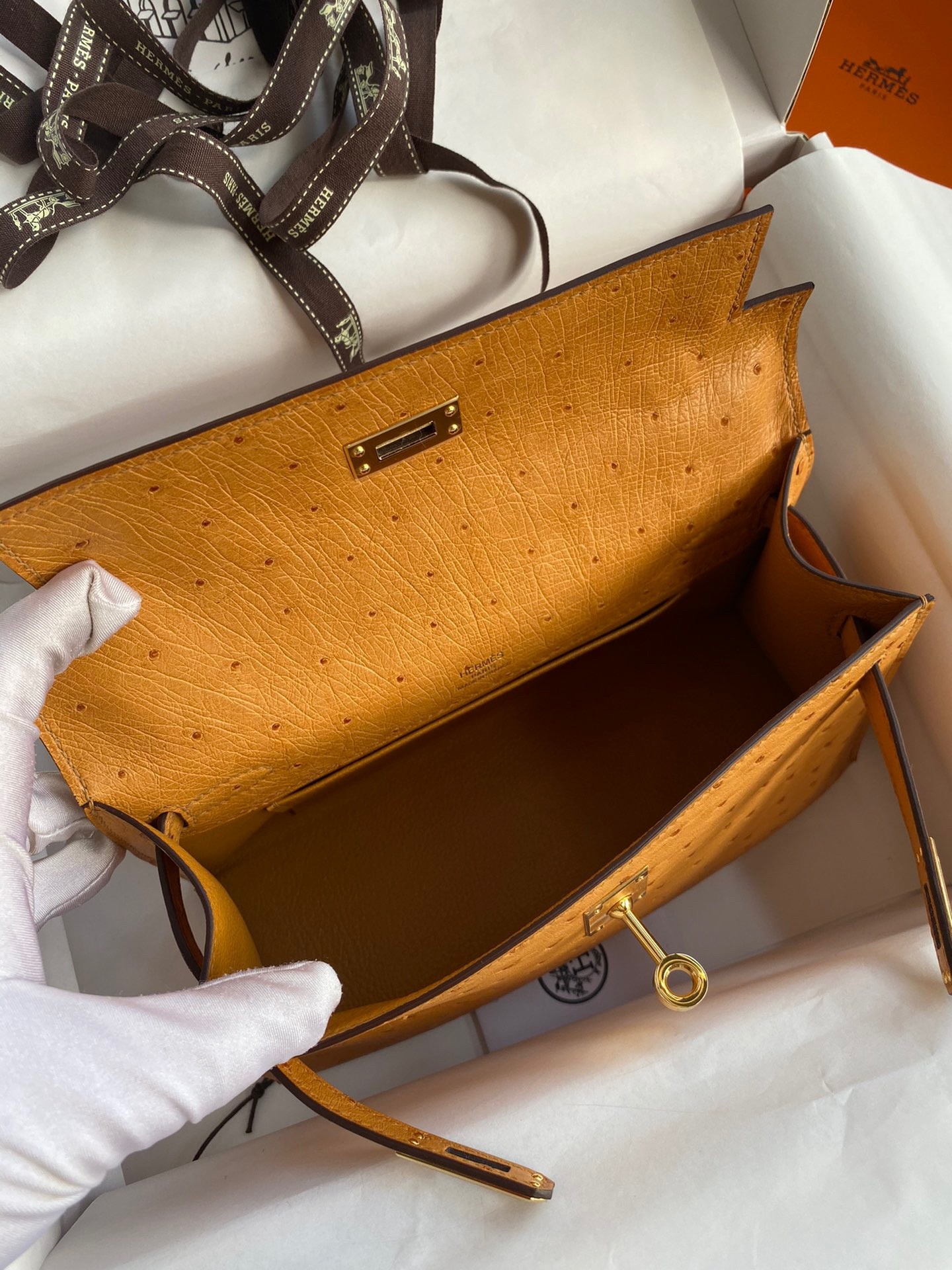 H**mes kelly pochette handmade bag in sesame ostrich leather
