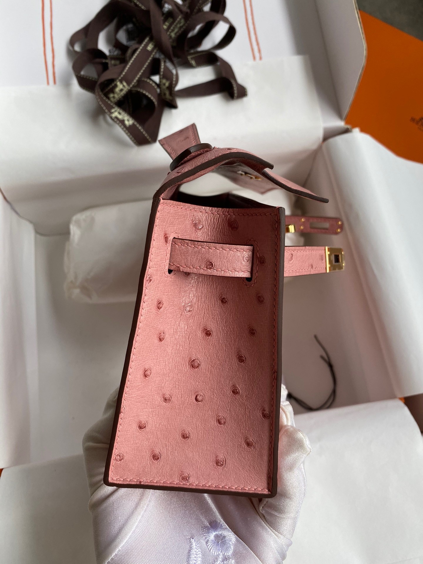 H**mes kelly pochette handmade bag in terre cuite ostrich leather