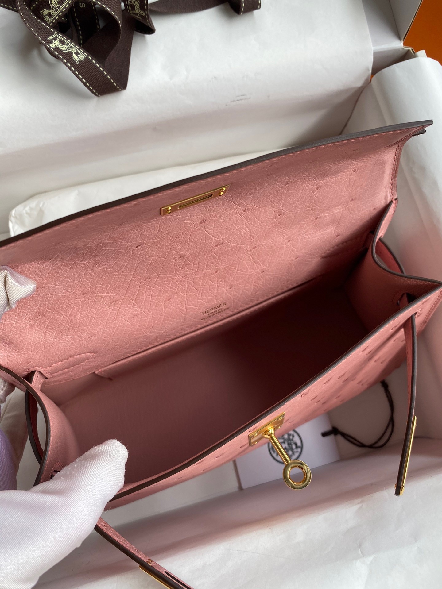 H**mes kelly pochette handmade bag in terre cuite ostrich leather
