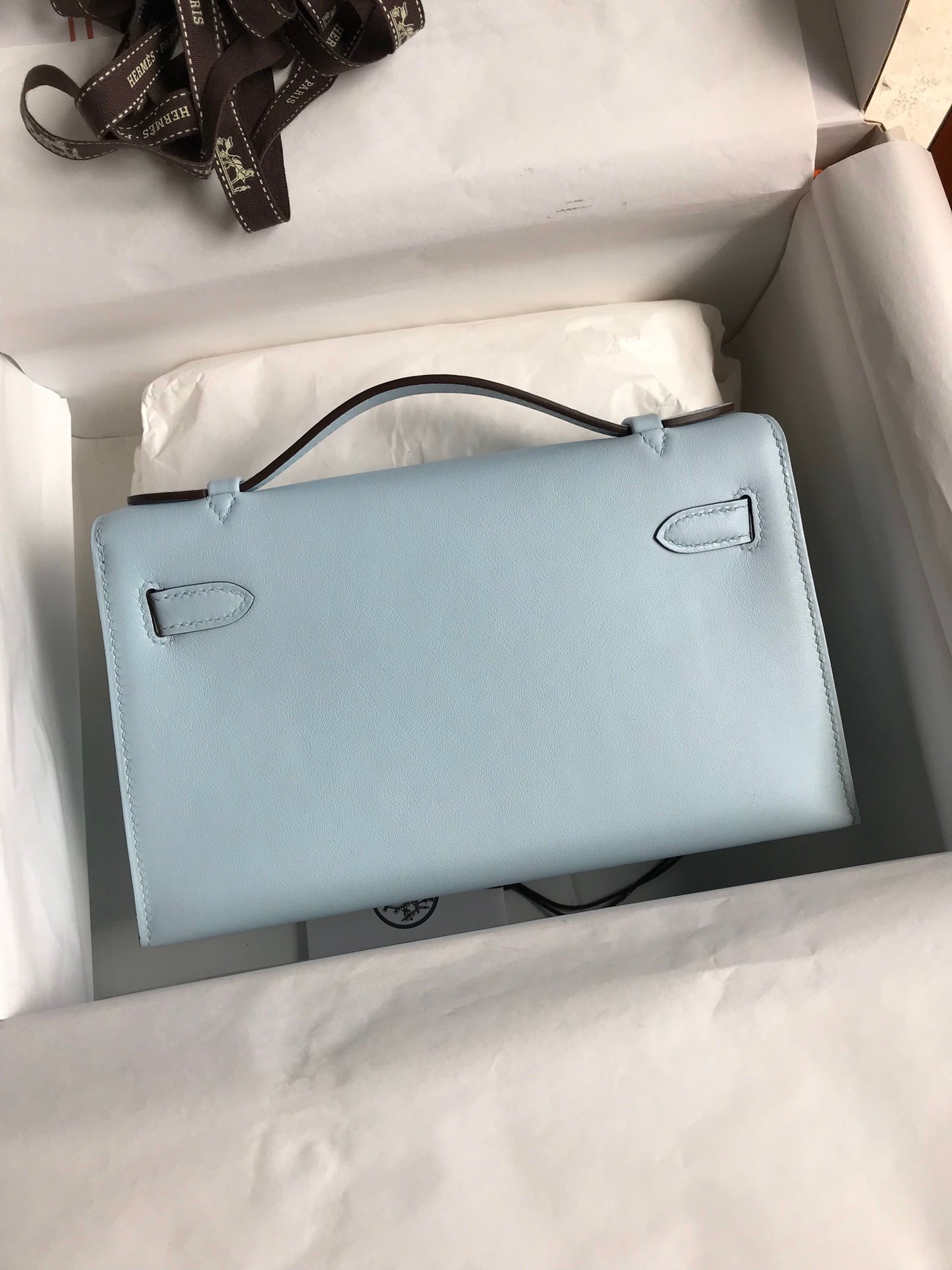 H**mes kelly pochette handmade bag in blue brume swift calfskin