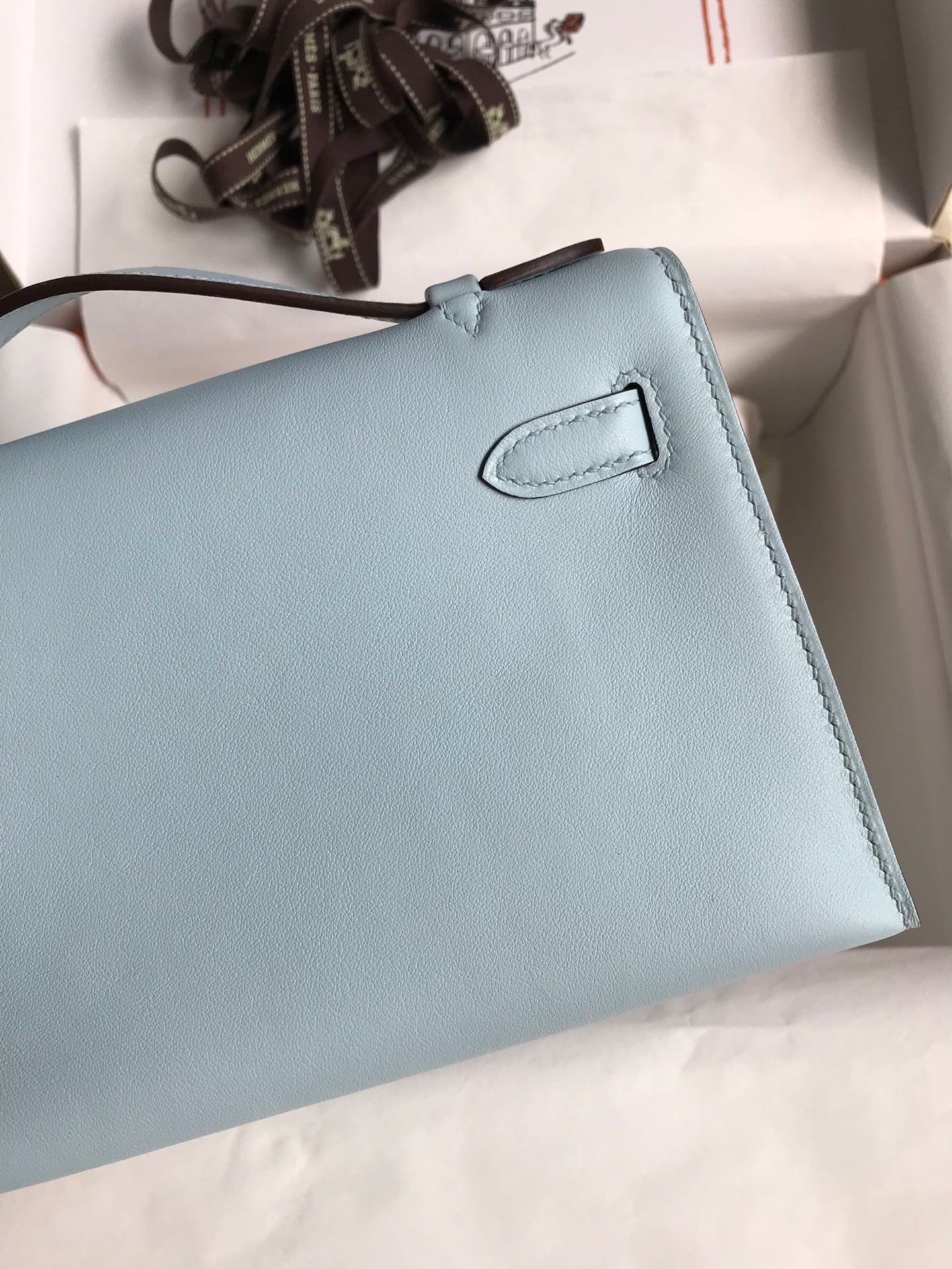 H**mes kelly pochette handmade bag in blue brume swift calfskin