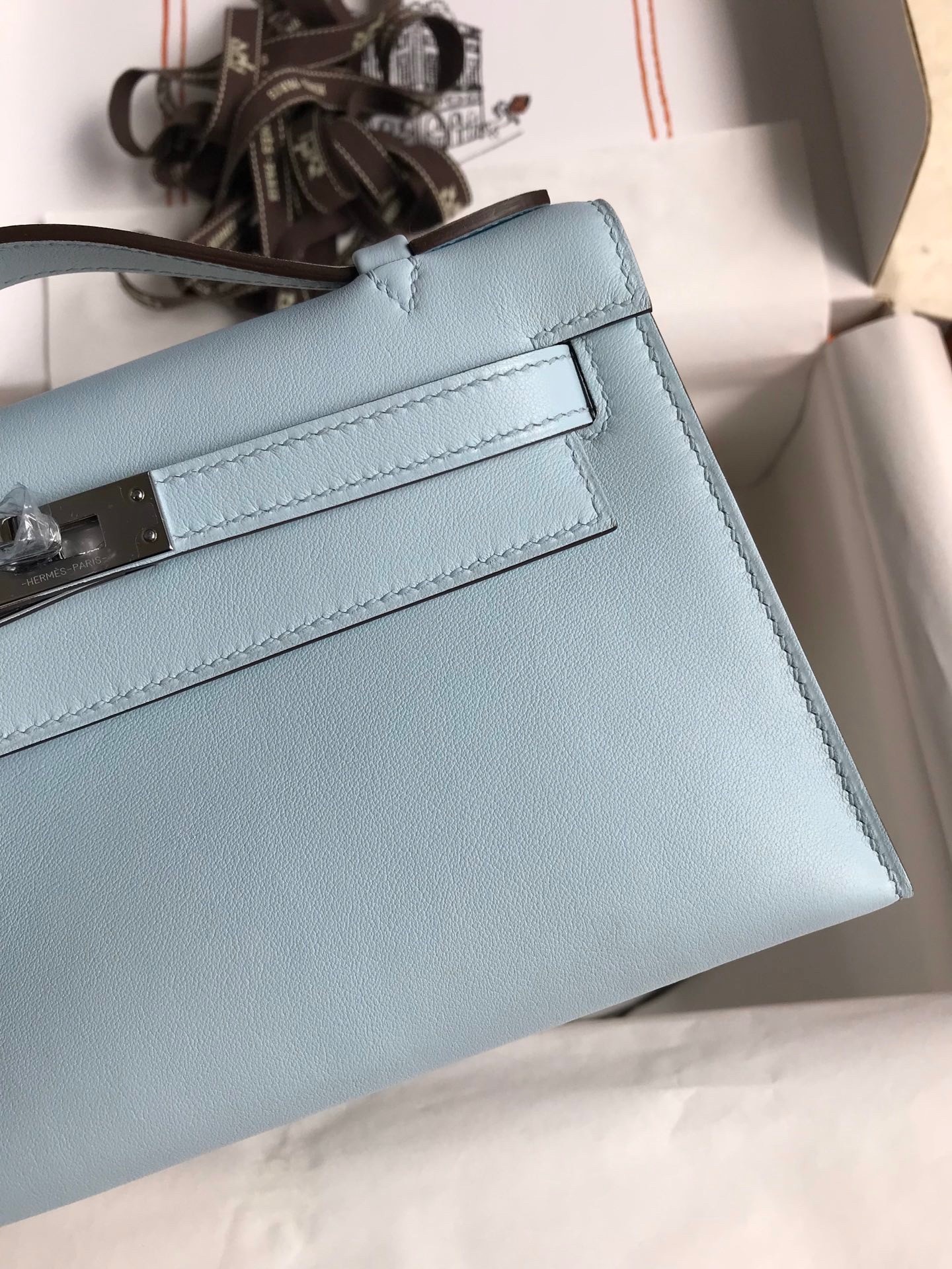 H**mes kelly pochette handmade bag in blue brume swift calfskin
