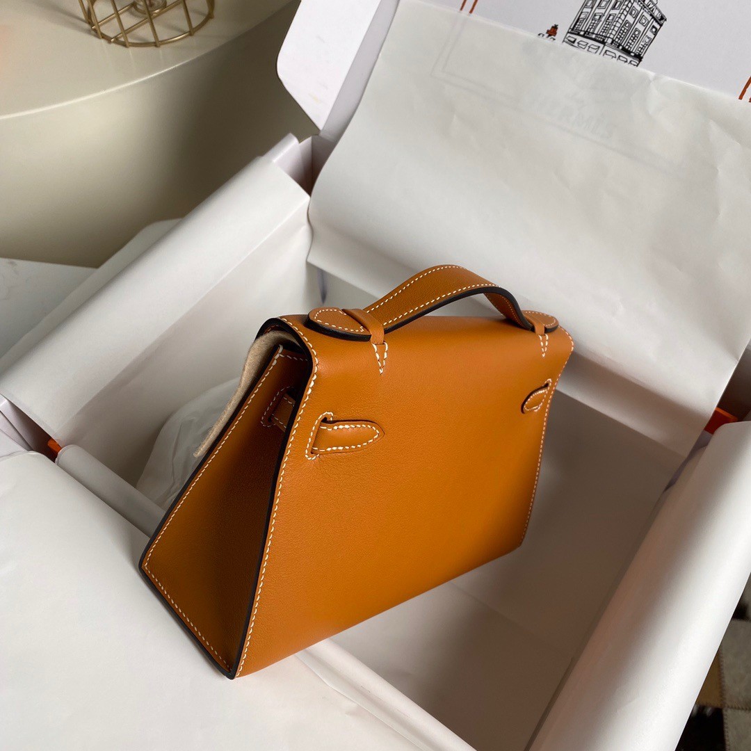 H**mes kelly pochette handmade bag in gold swift calfskin