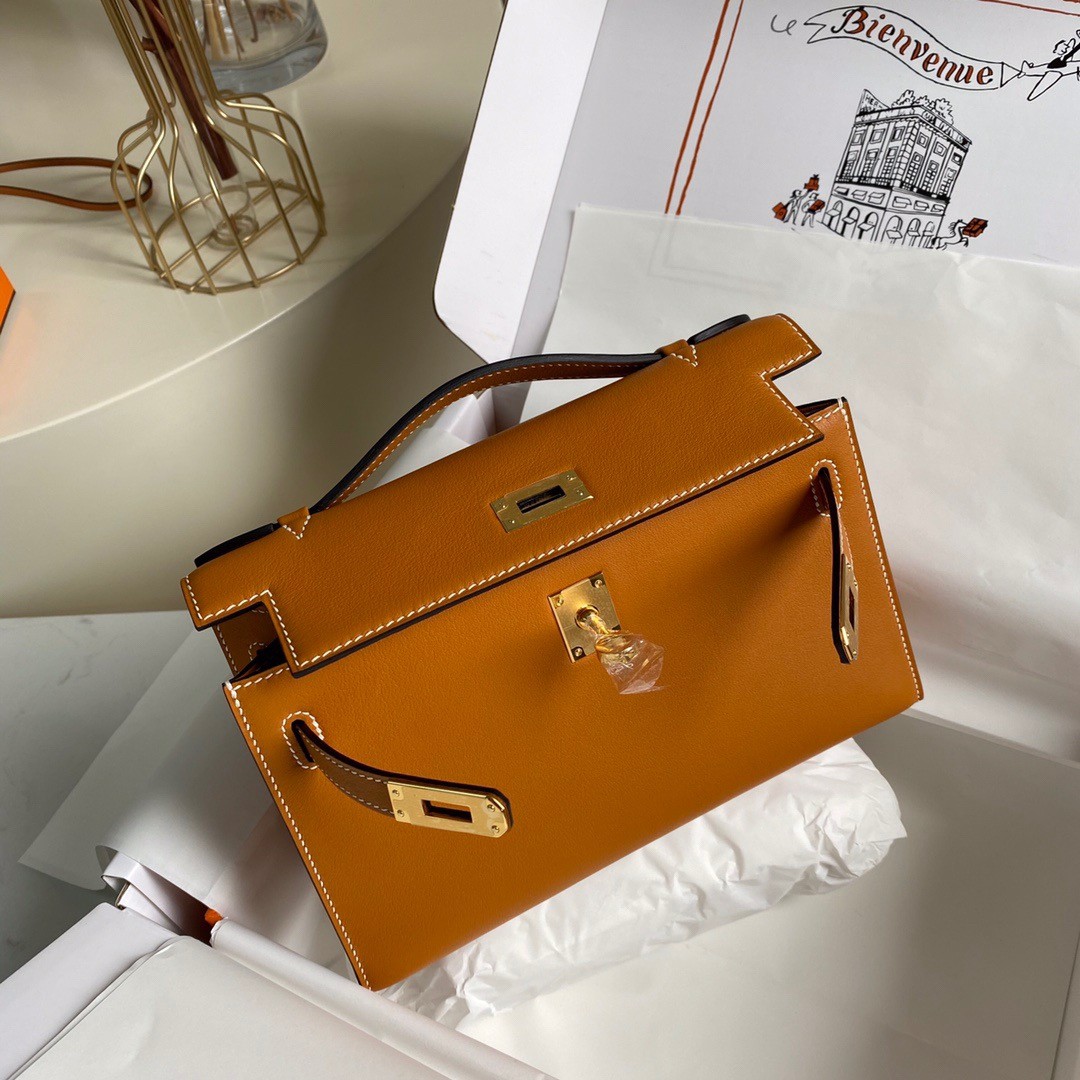 H**mes kelly pochette handmade bag in gold swift calfskin