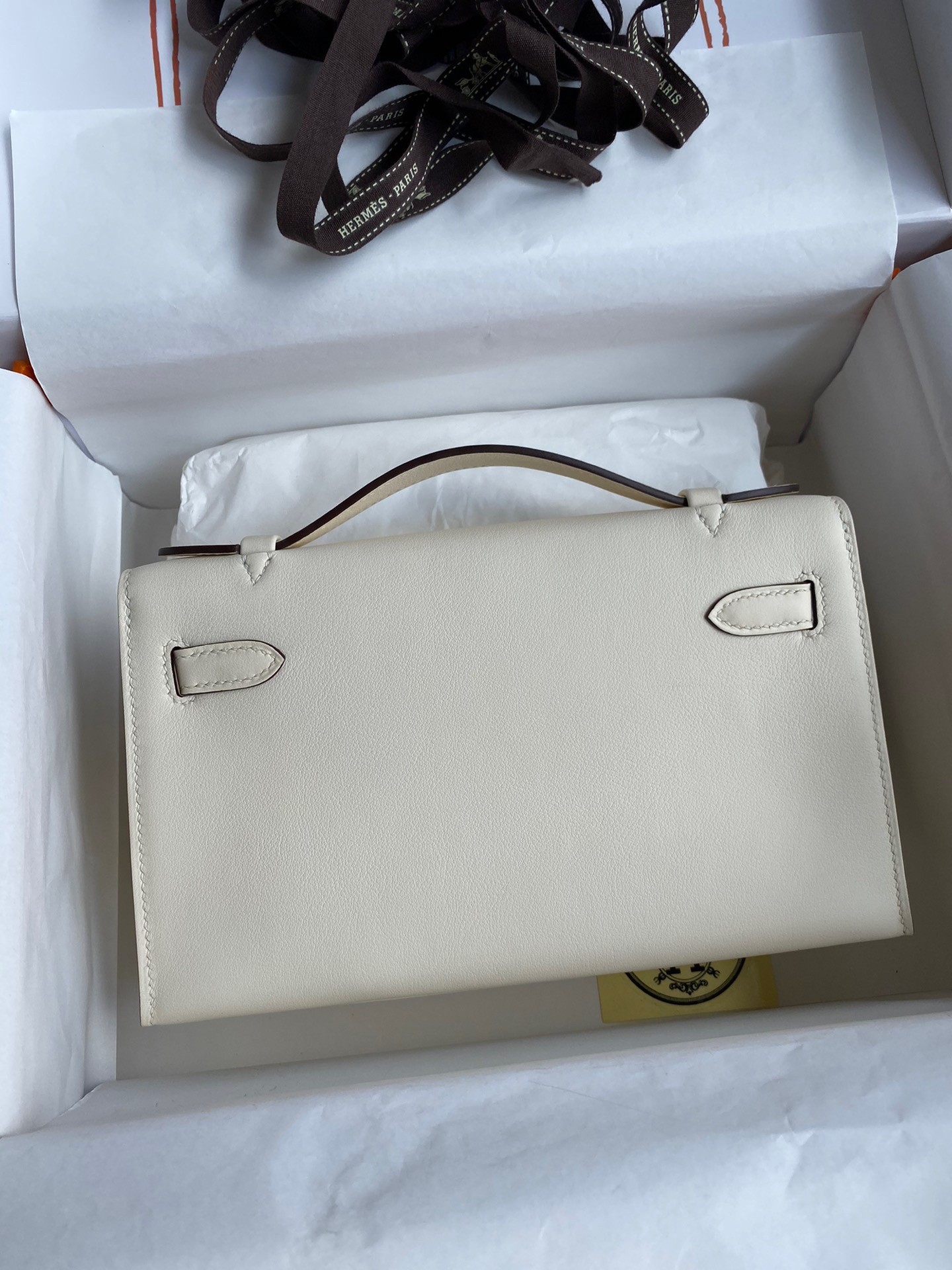 H**mes kelly pochette handmade bag in nata swift calfskin