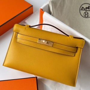 Hermes Kelly Pochette Handmade Bag In Jaune Ambre Swift Calfskin