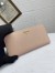 Prada Zip Around Wallet in Powder Pink Saffiano Calfskin