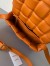 Bottega Veneta Padded Cassette Bag In Orange Lambskin