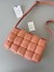 Bottega Veneta Padded Cassette Bag In Peachy Lambskin