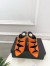 Saint Laurent Emilie Mules in Orange Satin