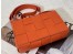 Bottega Veneta Cassett Bag In Orange Intrecciato Lambskin
