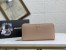 Prada Zip Around Wallet in Powder Pink Saffiano Calfskin