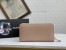 Prada Zip Around Wallet in Powder Pink Saffiano Calfskin