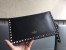 Valentino Rockstud Medium Clutch In Black Calfskin 