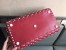 Valentino Garavani Red Free Rockstud Spike Duffle Bag