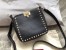 Valentino Mini Rockstud Hobo Bag In Black Grained Leather