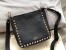 Valentino Mini Rockstud Hobo Bag In Black Grained Leather