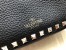 Valentino Mini Rockstud Hobo Bag In Black Grained Leather