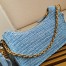 Prada Re-Edition 2005 Shoulder Bag In Blue Raffia