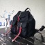 Prada Black Nylon Backpack With Red Metal Studs