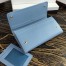 Prada Continental Wallet In Light Blue Saffiano Leather