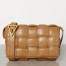 Bottega Veneta Padded Cassette Bag In Caramel Calfskin