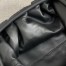 Bottega Veneta The Pouch Clutch In Black Intrecciato Leather