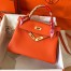 Hermes Kelly Retourne 28 Handmade Bag In Orange Clemence Leather