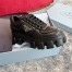 Prada Women's Sneakers in Black Padded Nappa Leather 
