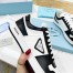 Prada Downtown Sneakers in White and Black Calfskin